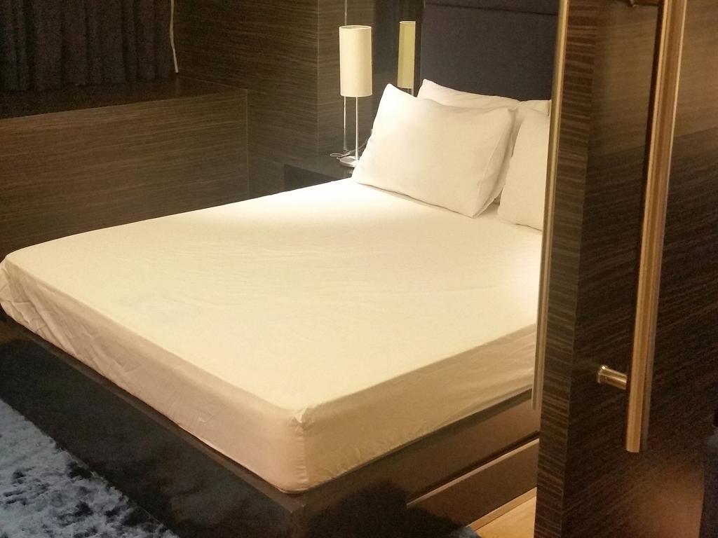 Shang Luxury Suites ماندالويونغ الغرفة الصورة
