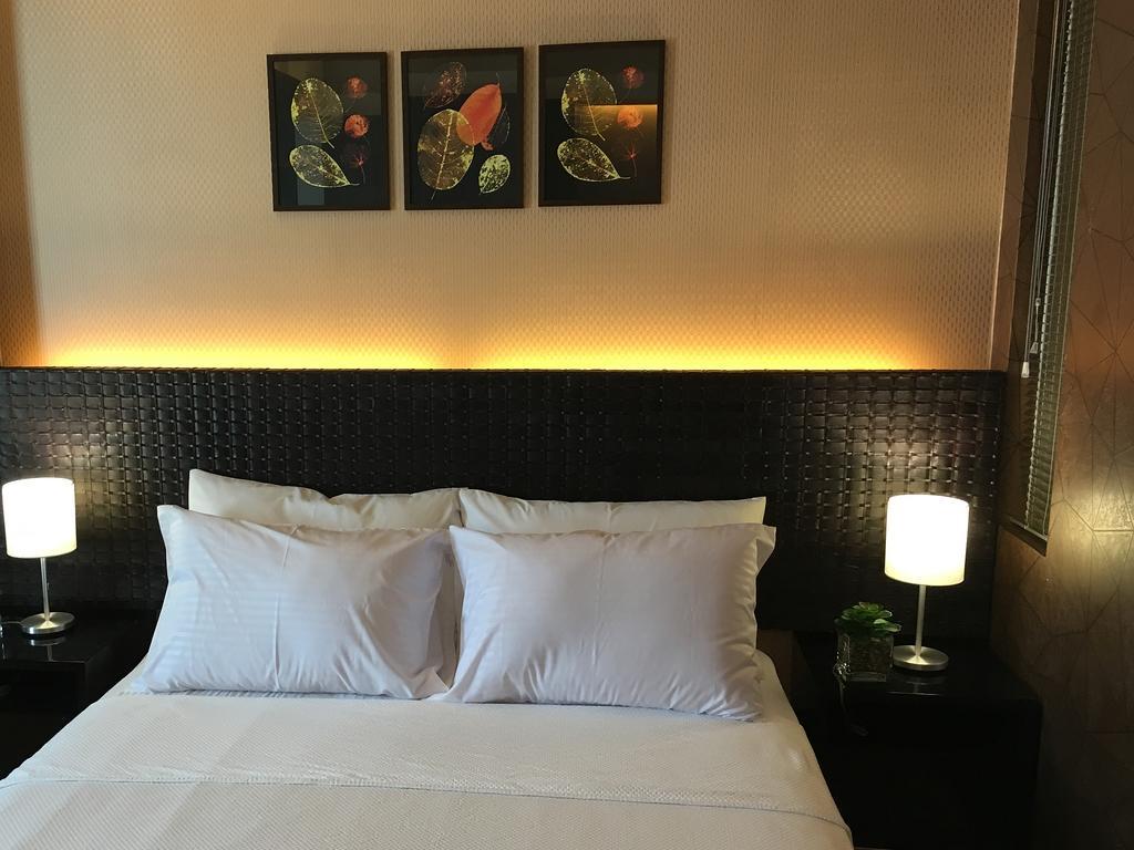 Shang Luxury Suites ماندالويونغ الغرفة الصورة