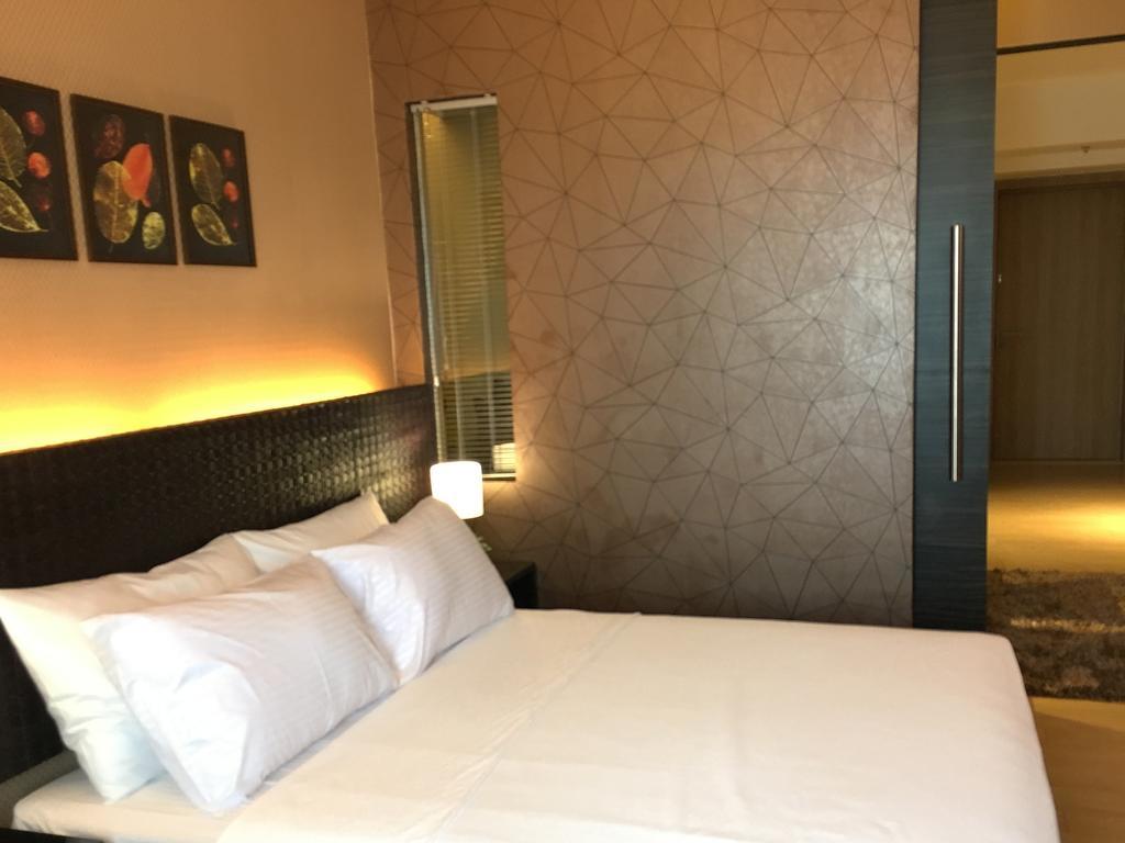 Shang Luxury Suites ماندالويونغ الغرفة الصورة