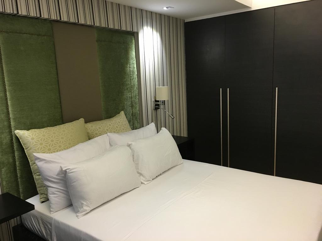 Shang Luxury Suites ماندالويونغ الغرفة الصورة
