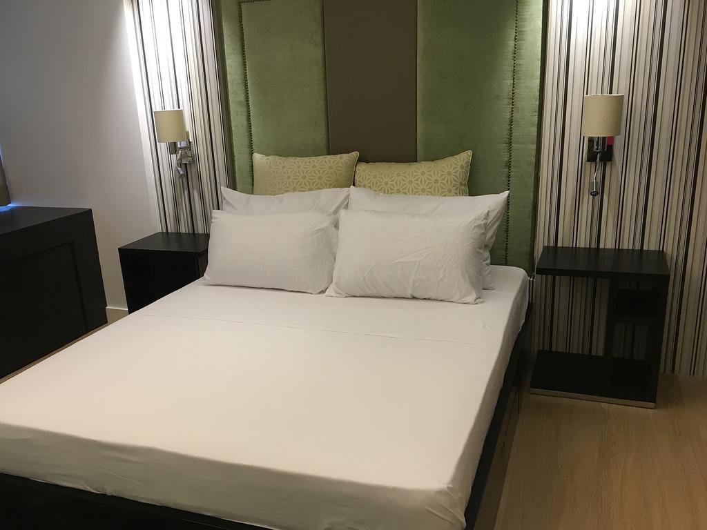 Shang Luxury Suites ماندالويونغ الغرفة الصورة