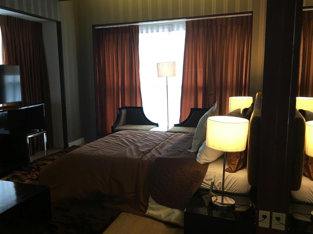 Shang Luxury Suites ماندالويونغ الغرفة الصورة